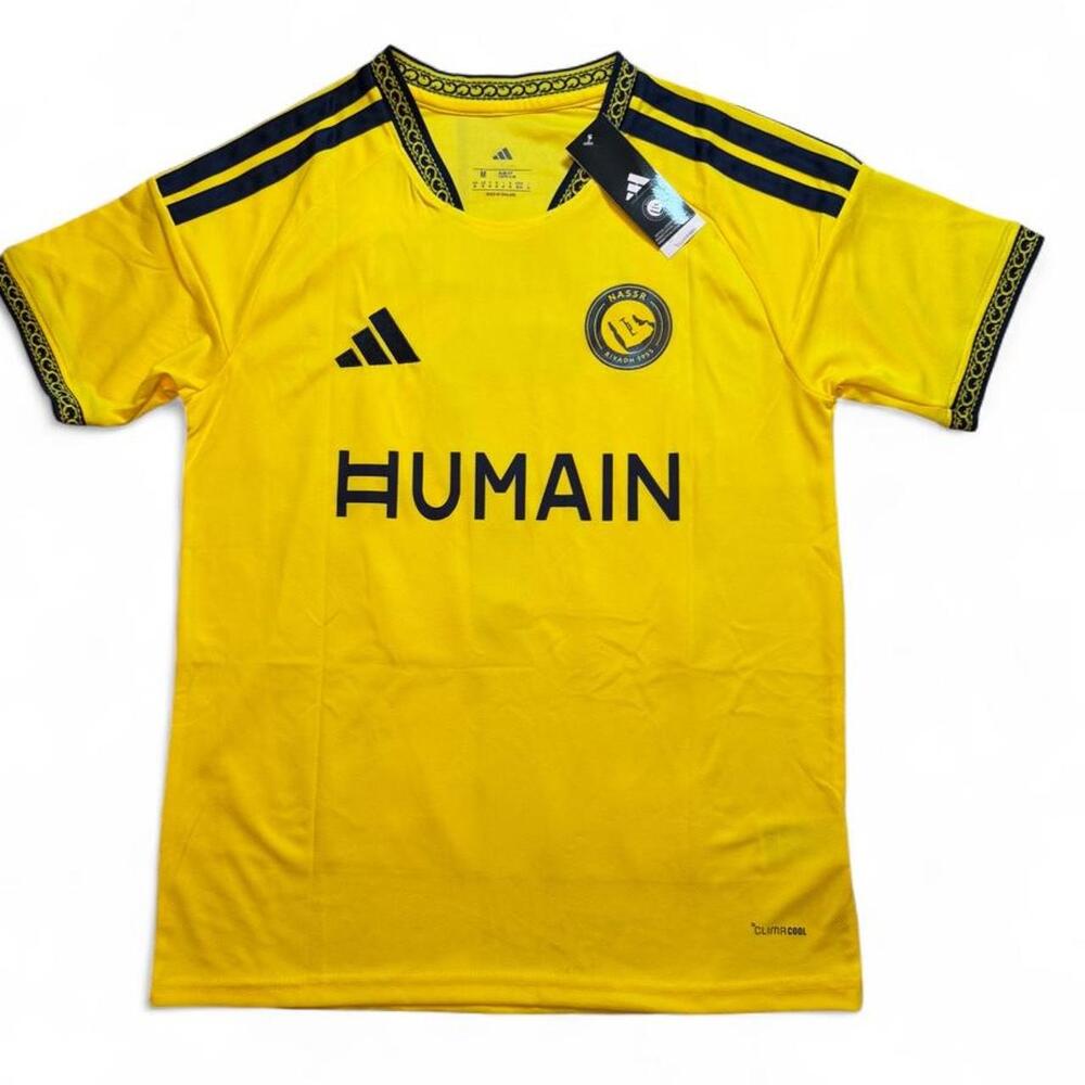 Al Nassr 2026/27 Adidas home yellow jersey with navy stripes on shoulders and sl